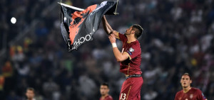Alexandar Mitrovic grabbing the Albanian Flag